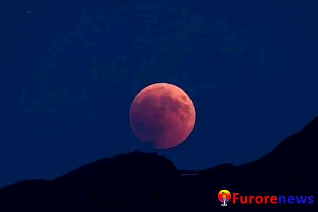 Watch Friday's 'Strawberry Moon' Darken With a Partial Penumbral Eclipse